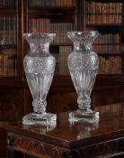 A matched pair of modern substantial cut glass baluster vases