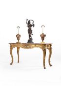 A pair of Regence carved giltwood side tables