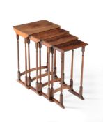 A George III mahogany nest of four quartetto tables