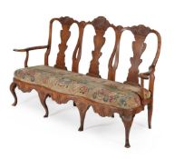 A Danish carved beech and needlework upholstered chair back settee