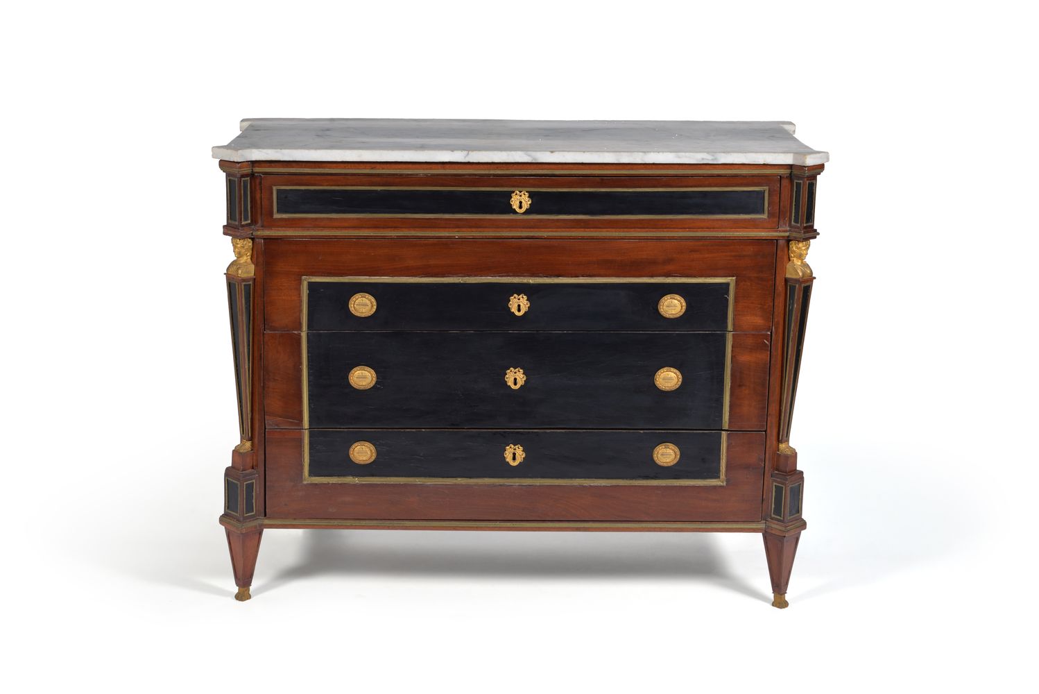 A giltmetal-mounted mahogany and ebony commode, possibly Baltic or Russian, circa 1800, the shaped