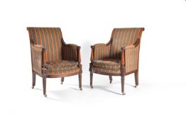 A pair of walnut bergeres, of Regency style, by Frederick Parker and Sons, circa 1938 and recently