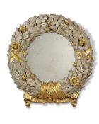 A pair of French parcel-gilt and composition wall mirrors, 20th century, in the form of wreaths of
