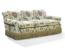 A modern sofa, 20th century, upholstered in green, red and gold cut velvet, on castors, 83cm high,