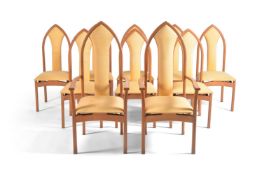 A set of ten oak and upholstered dining chairs including a pair of armchairs, by the Edward Barnsley