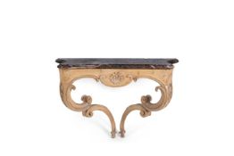 A carved pine console table, in continental 18th century style, the moulded inverted serpentine