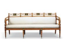 A George III polychrome painted quadruple chair back settee, late 18th century, the X-pattern top