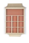 A pair of modern white painted hanging display cabinets, by Colefax and Fowler, the waisted,