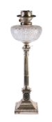 An Edwardian silver columnar table oil lamp