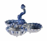 A Bow porcelain blue and white trefoil shell table salt with dolphin finial