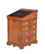 ϒ An early Victorian satinwood Davenport