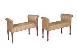 A pair of mahogany and upholstered window seats