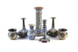 A pair of Doulton Lambeth Pottery Stoneware bottle vases