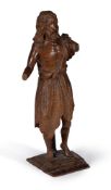 A Continental, probably German or French, sculpted walnut model of St John the Baptist, 16th century
