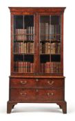 A George II walnut cabinet on chest, circa 1720