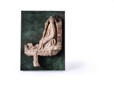 A Nottingham carved alabaster fragmentary relief of the Annunciation, 15th century