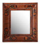 A William & Mary walnut, ebonised and marquetry decorated cushion framed wall mirror, circa 1690, at