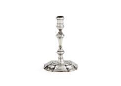 A George II cast silver taperstick by James Gould