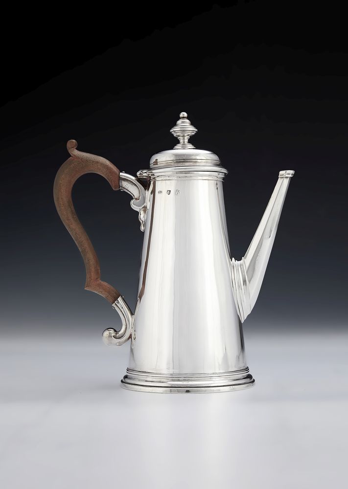A George I silver straight-tapered coffee pot by Edward Feline