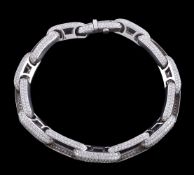 A diamond belcher link style bracelet