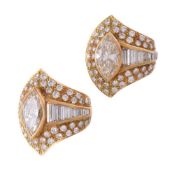 A pair of diamond ear clips
