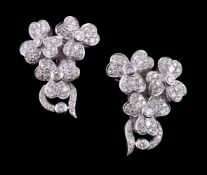 A pair of diamond floral spray earrings