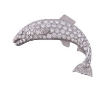 An 18 carat gold diamond salmon brooch by Alabaster & Wilson