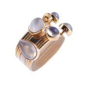 A set of seven 18 carat gold and gem set stacking rings by Wendy Ramshaw