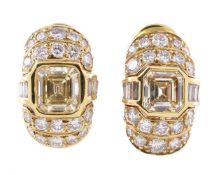 A pair of step cut diamond ear clips