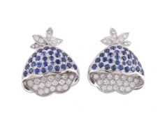 A pair of sapphire and diamond floral earrings