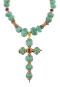An emerald and ruby cross pendant by Natalia Josca
