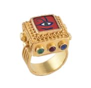 A gold coloured, enamel and gem set ring by Natalia Josca