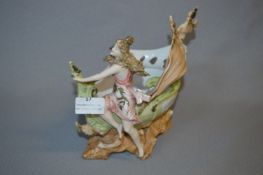 Continental Porcelain Figurine - Girl on Shell Sailing Boat