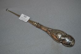 Silver Handled Button Hook with Cherub Design