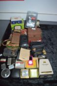 Large Quantity of Collectibles; Travel Clocks, Cameras, Lighters,