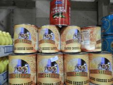 *Twelve Cans of Nacho Cheese Sauce and a Can of Ja