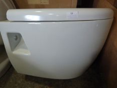 *Wall Mounted White Toilet