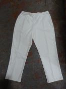 *Fourteen Pairs of White Trousers (Various Sizes)