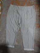 *Four Pairs of Grey Trousers (Various Sizes)