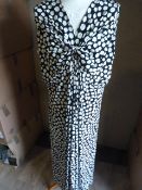 *Seven Black & White Spotted Dresses (Various Size