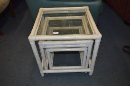 Nest of Three Painted Glass Topped Tables
