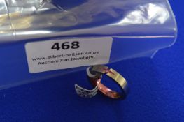 *Titanium Ring with Pink Diamond