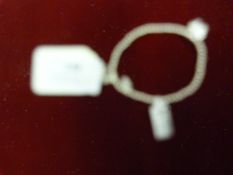 *Silver Bracelet with Silver Bow Charm