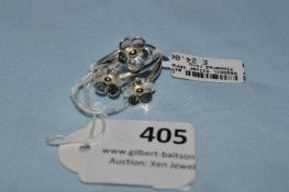 *Silver Coloured Three Flowered Ring