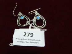 *Pair of Silver Earrings Set with Opals