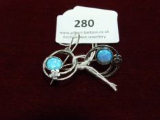 *Pair of Silver Earrings Set with Opals