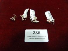 *Four Pairs of Silver Stud Earrings (Various Desig