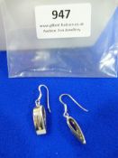 *Pair of Silver Earrings