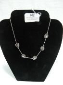 *Silver Necklace with Leaf Design Charms