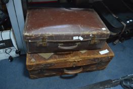 Two Distressed Leather Suitcases